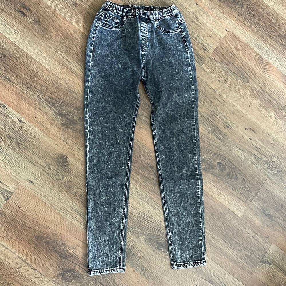 Cool charcoal washed jeans,Lightning symbols on back pockets,European brand